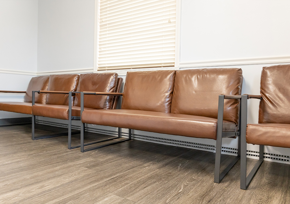 Leather chairs in dental office waiting room