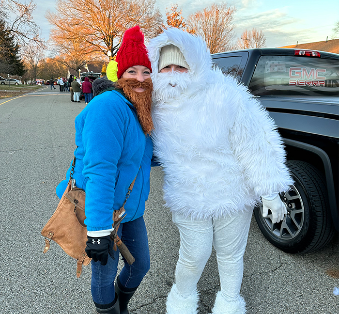 Two people dressed as the abominable snowman and Yukon Cornelius