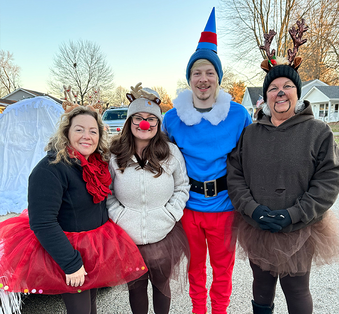 Dental team members dressed as elves and reindeer