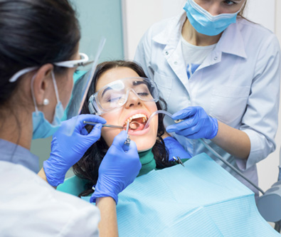 Woman getting a dental treatment