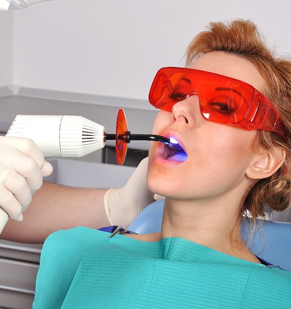 A woman getting a tooth-colored filling