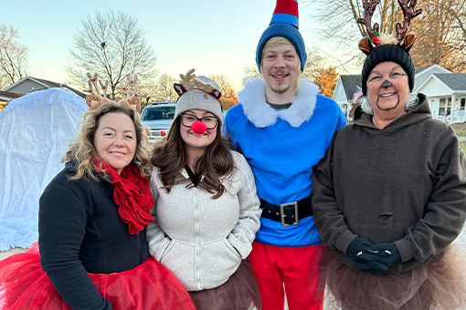 Waverly dentists and team members in festive holiday outfits