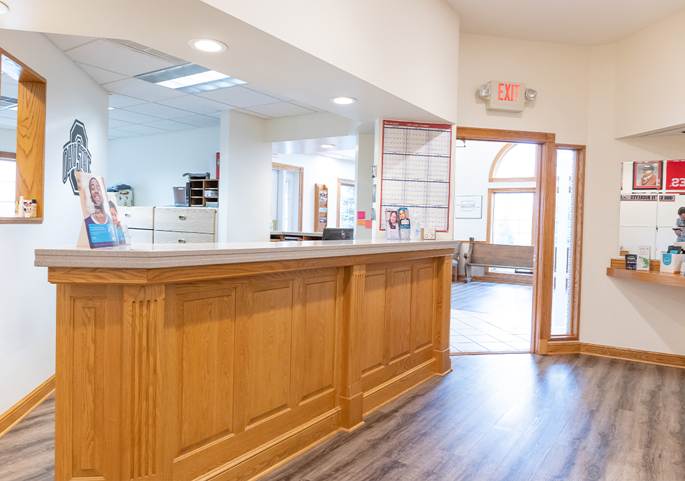 Reception desk in front room of Peebles dental office