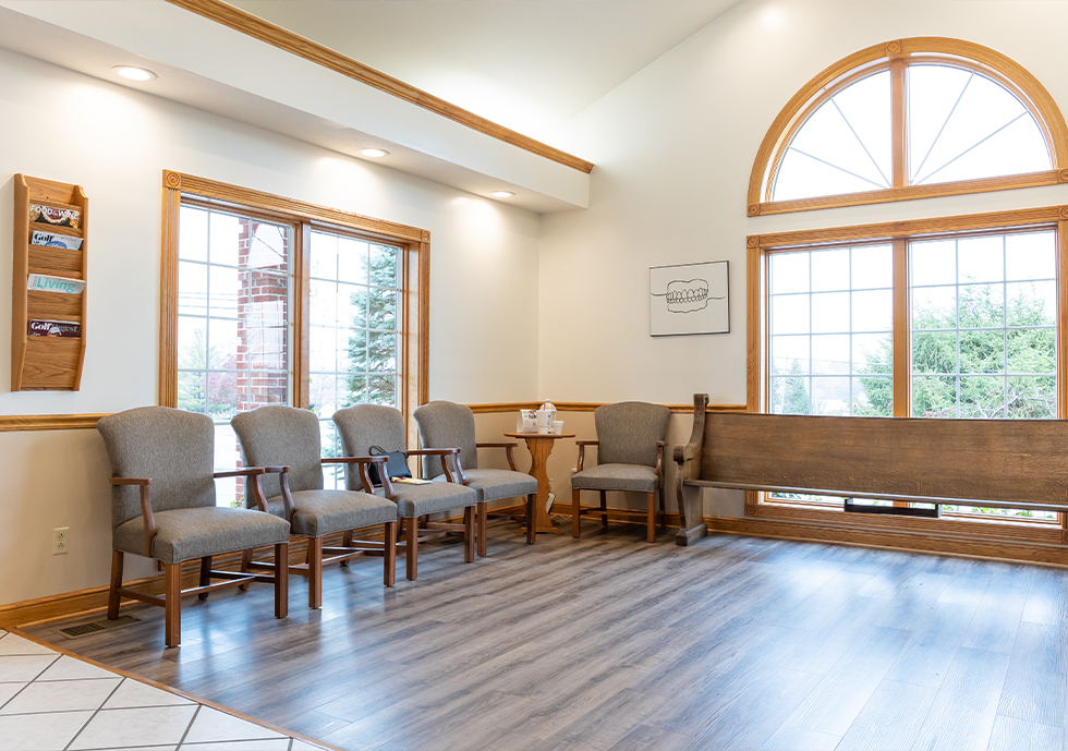 Chairs and windows in dental office reception area