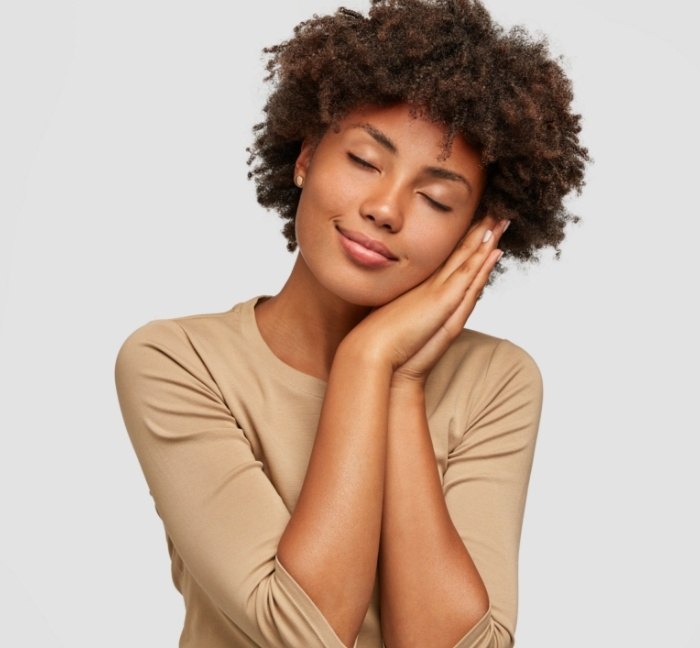 Woman relaxing after sedation dentistry in Waverly