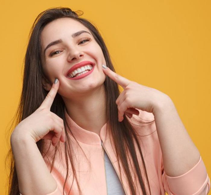 Lady shows off pretty smile